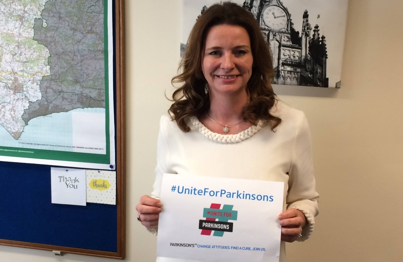 Gillian with #UniteforParkinsons poster 