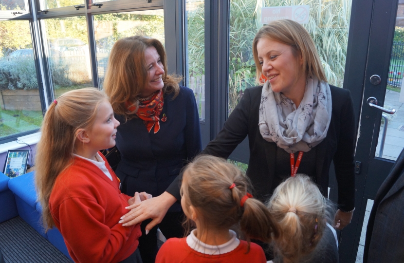Gillian with Deputy Head at Bosham and children who showed her around