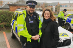 Gillian with police officer on a speed prevention day